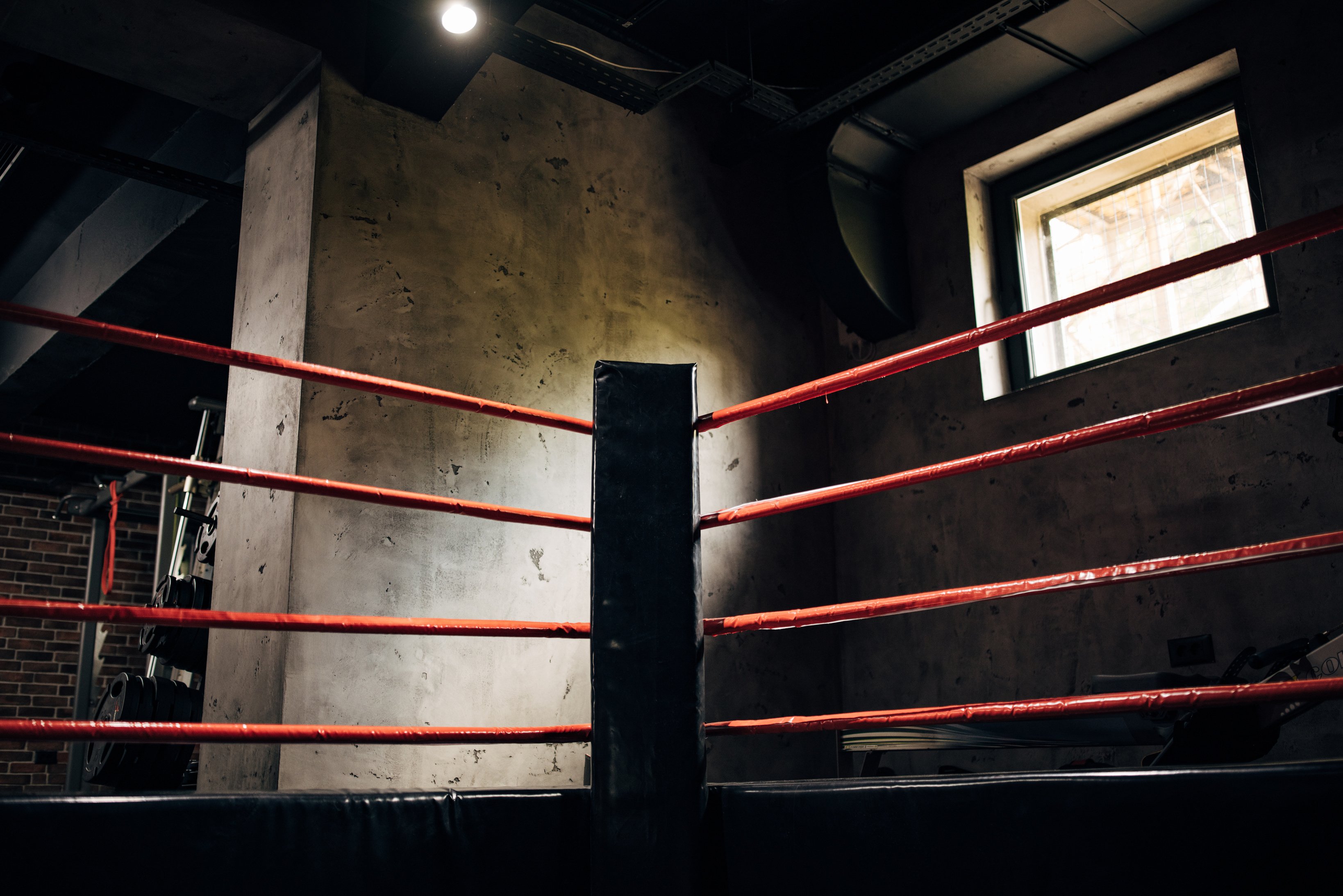 Boxing ring in empty gym